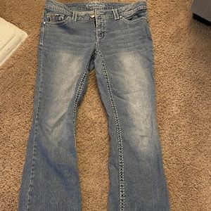 Low rise flared blue jeans